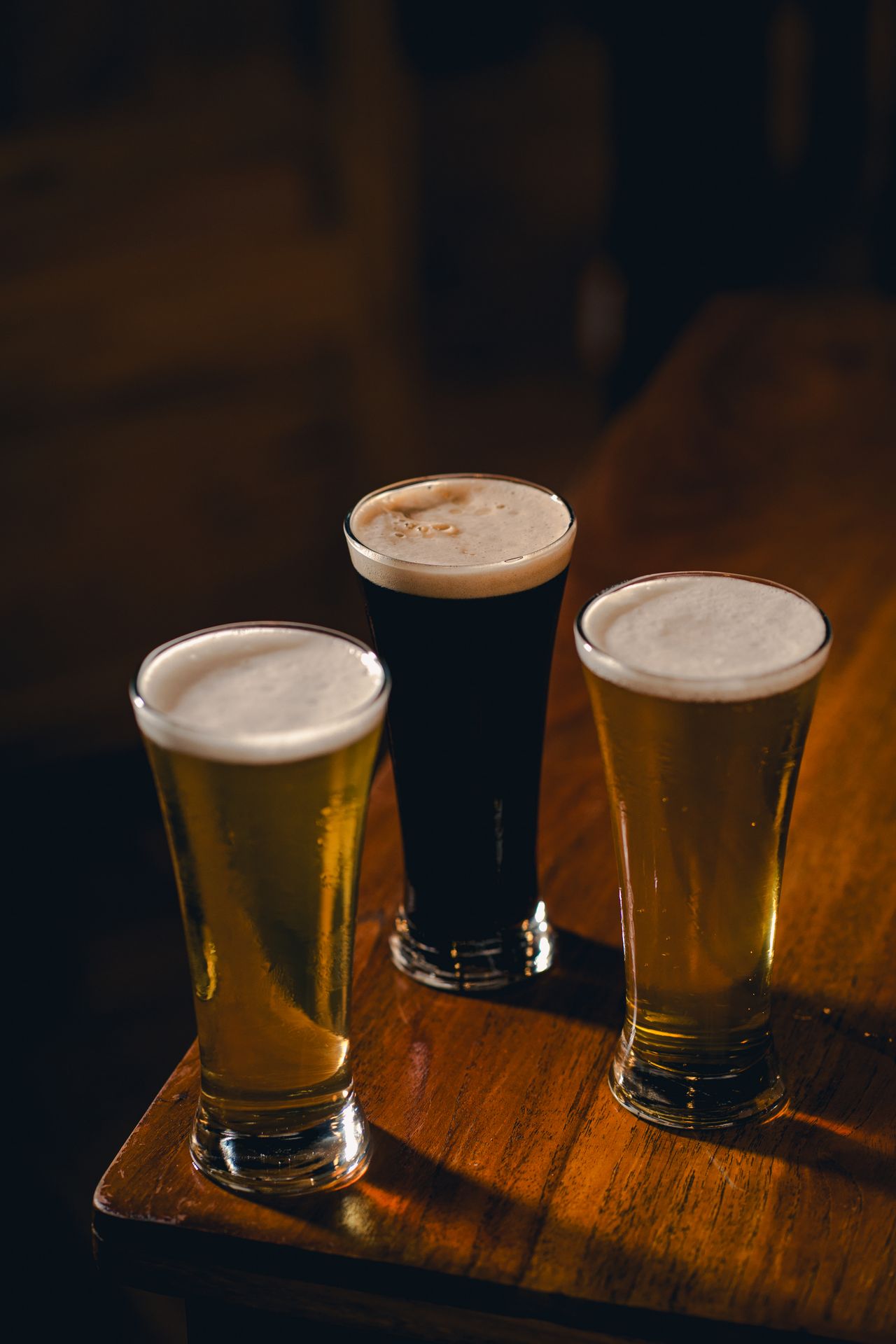 Cold craft beer on tap at a waterfront BBQ restaurant in Labuan Bajo